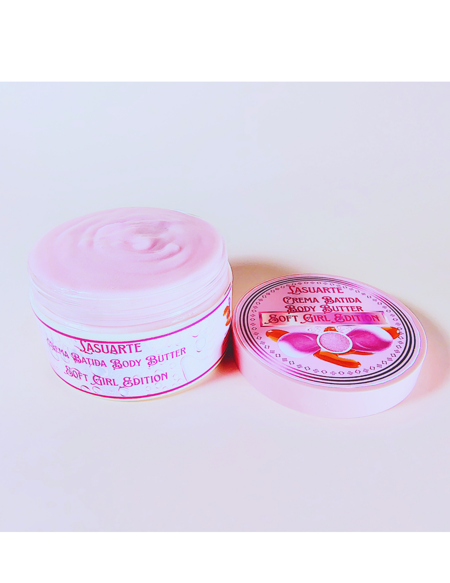 Two containers of lasuarte Crema Batida body butter on a white background